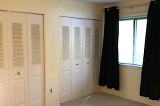 Bedroom with double closets - 1BR condo-Meadow Woods Lane-Lawrenceville