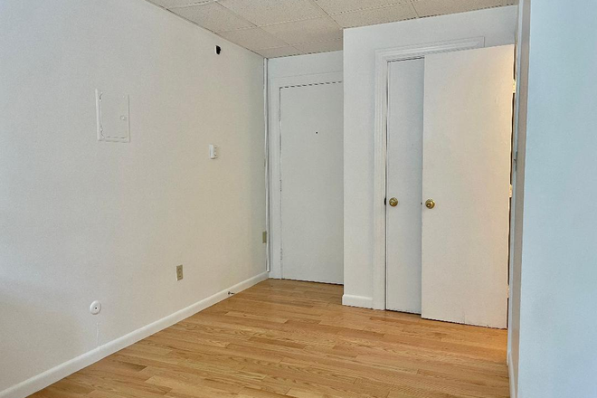 Living Space - Available Now – Sunny Beacon Street Studio with Hardwood Floors Apartments