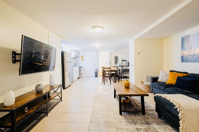 Living Room - Luxury, Pet-Friendly 1B/1B Apartment Available Near JHU Shuttle Stop & Penn Station