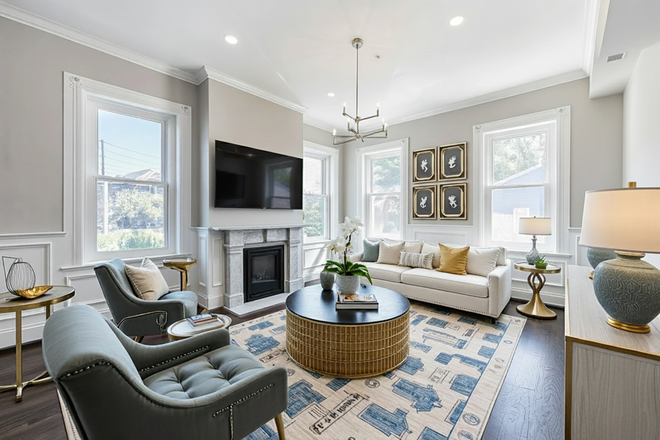 living room - Stunning sun filled renovated 3 bed with parking included - landlord pays the fee!