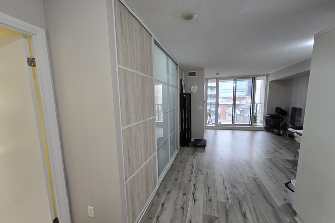 Living Room - Furnished Den in a 1-Bed + Den at City Hall