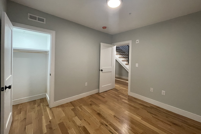 living - STUNNING NEW 4 BED/3.5 BATH, WITH IN-UNIT LAUNDRY! AVAIL 9/1/26! Apartments