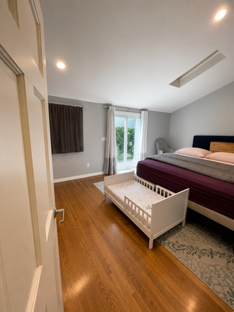Primary bedroom - 2 bed + office, 2 Full Bath. No fee. 9/1. Close to Sloan. Quiet neighborhood Condo