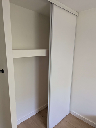 larger bedroom - 2 Furnished Bedrooms in a 4-Bedroom 2-Floor Condo
