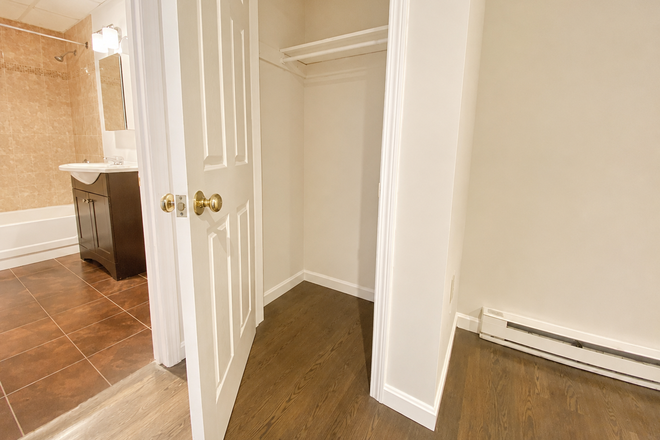 1 - GROUND LEVEL  Renovated 2 bath laundry in unit Avail 9/1 Apartments
