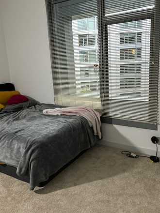 Bedroom with window view - Private bedroom with attached private bathroom sublet Apartments