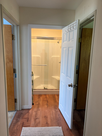 Shower room at the end of the hall - Windover House Apartments