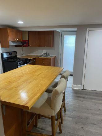 Kitchen bar with bar stools - Private 2BR Apartment Near UMD – Utilities + Wi-Fi Included