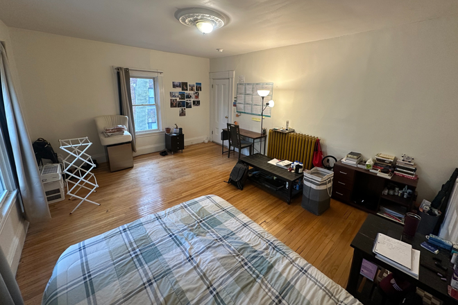 Queen bed with window view - blackout curtains, natural afternoon light - Large Furnished Bedroom near Harvard Square - June/July Sublet Apartments