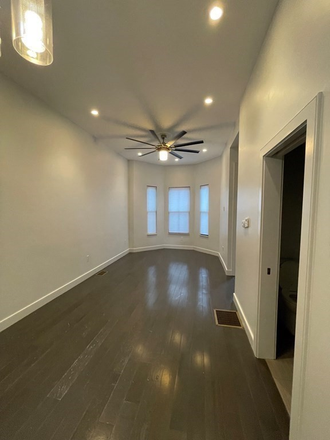 Living Area - HUGE and RENOVATED 4Bed/3Bath Steps from Campus! Apartments