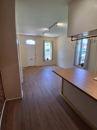 Entry and Living Room - Freshly Updated Apartment in The Grove