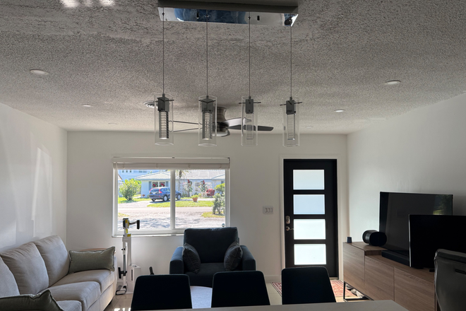 Open concept living room - Croissant Park Apartment