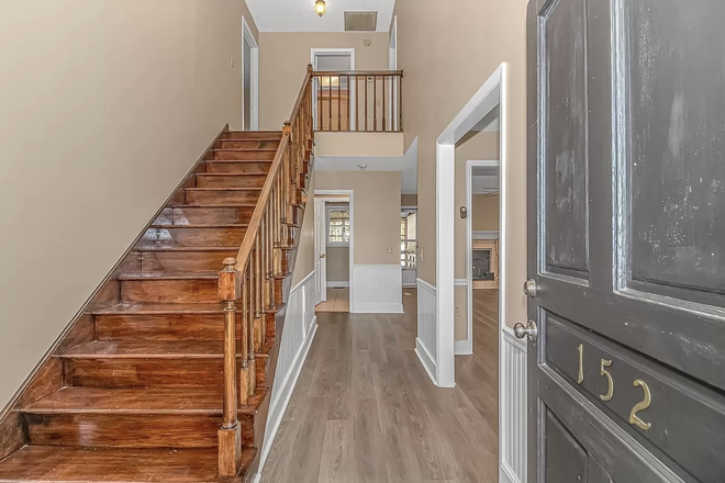 Front entrance - House 1 mile from campus backs up to golf course.