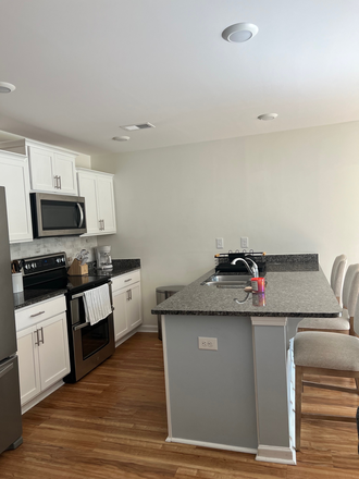 Kitchen - Cozy Room in Newer Townhome - Perfect for Students!
