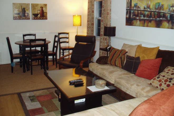 Shared sitting room with eating area - Furnished rooms in Fully Furnished Townhouse -- Walk to GMU