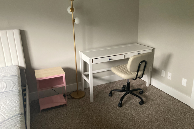 Desk with chair, bedside table - Graduate Court Apartments