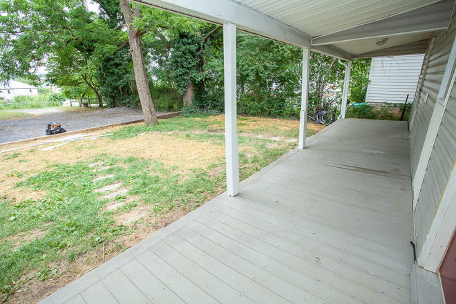 Back yard with parking lot - 230 Chicago Ave, Harrisonburg, VA- Spacious Downtown Duplex with Charm and Character! Duplex