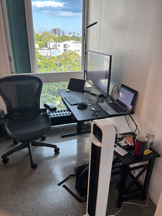 Bedroom desk with chair, coffee table - Peabody Terrace With a Great View - Fully Furnished One Bedroom in 2B1B Apartments