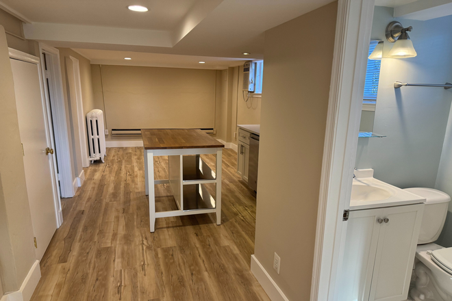 Hallway looking toward living room and kitchen - 2BR/1BA basement apartment 1mile from UMD, 1/2 block off US1 on bus route - ALL UTILS INCLUDED