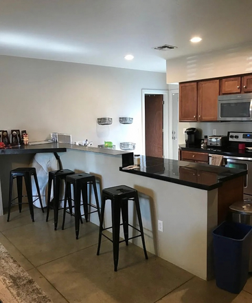 Kitchen with Breakfast Bar - $650 per Room.  Upscale 4-bed 2-bath - Walk/Bike to Campus - ½ Mile from UofA - Free Parking & W