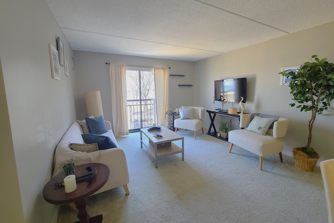 Living Room - Two Bedroom with Heat & AC included Next to Campus*Ask about Group Showings* Apartments