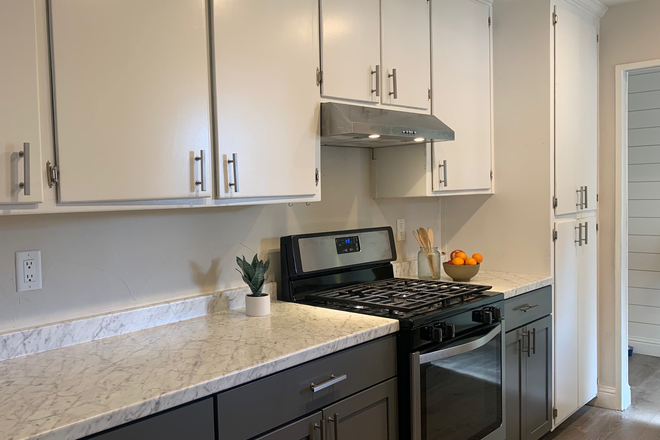 Expansive storage, pantry, stove, and microwave. - Quiet home, two furnished bedrooms with a shared bath, co-ed house