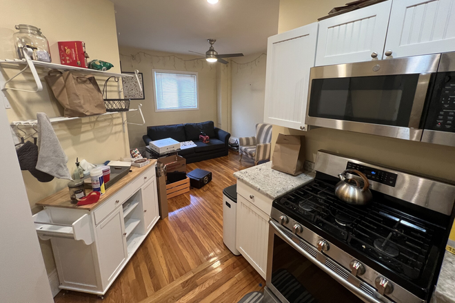 visit hubrealtyproperties.com - Spacious 3 bedroom with newly renovated kitchen and bath, laundry in unit, near Davis Square Apartments