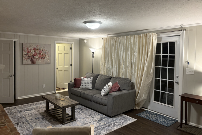 Living Room - EVERYTHING INCLUDED Furnished Terrace Level/Walkout Basement Apartment