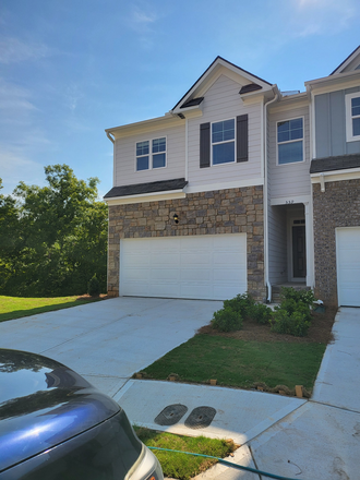 outdoor from the street - 1 mile from Dahlonega campus!  Brand new subdivision with pool and fitness center going in!! Townhome