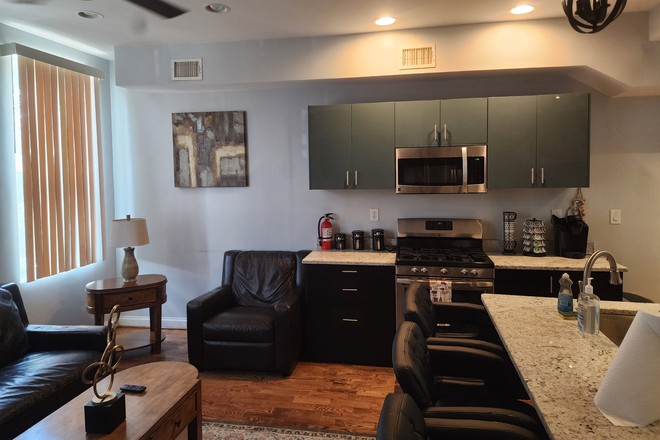 Living Room/Eating Area - Scott Street Townhome