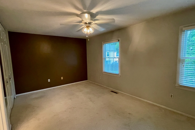 Master Bedroom - Three Bedroom Townhome close to bus stop and Food Lion and 2 miles from the VT campus