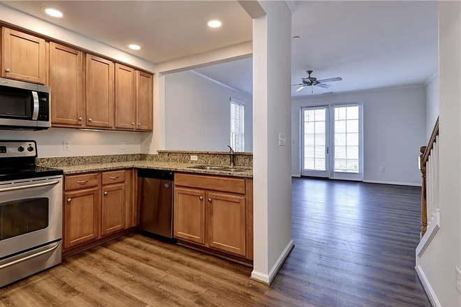 Kitchen & Living Room - Furnished Private BR + Full Bath | New Town Condo | $1,100/mo