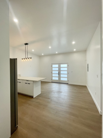 Open Concept Living Room - Modern 2-Bed, 1-Bath ADU in Magnolia Duplex