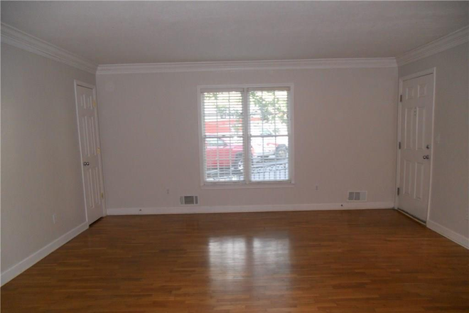 Living Room - 1st level Condo with Private deck in Convenient Location for CDC, Emory, Down Town Decatur, Shopping