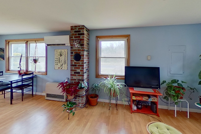 Living Room - Heat Included Three Bedroom in North Amherst Apartments