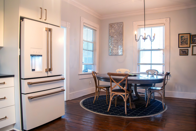Open-concept flow between kitchen and dining spaces - 4BR/3BA Renovated Hampton Park Home | Minutes to MUSC