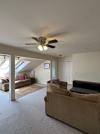 Living room - Riverwatch Condo, top floor w/ washer and dryer