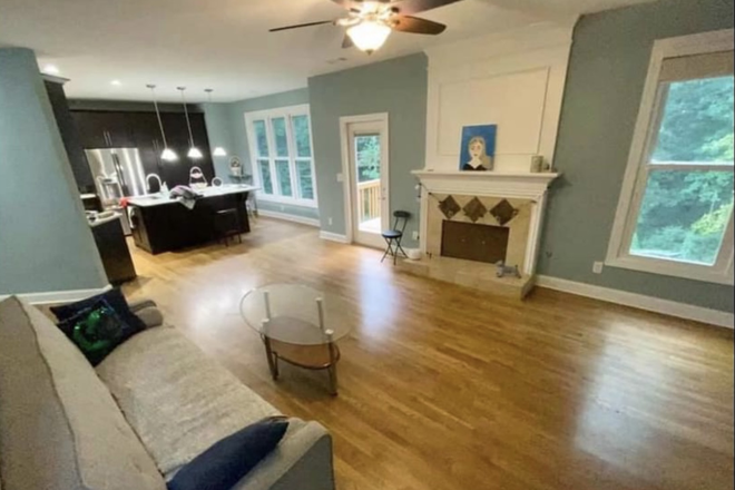 Shared living room - One furnished Room available. Utilities included! House