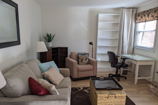 Living room and study area - One-bedroom apartment, midway and walkable between GMU and downtown Fairfax