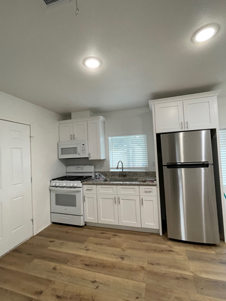 Kitchen & Front door - Walk/Bike to UCR! Private Studio with own Room, Restroom, Kitchenette & Laundry!