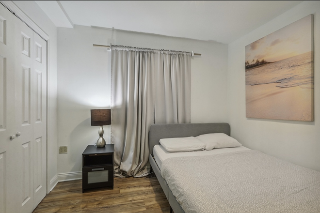 Bedroom - Furnished 4bedroom, 1 bath, basement apt in Pilsen