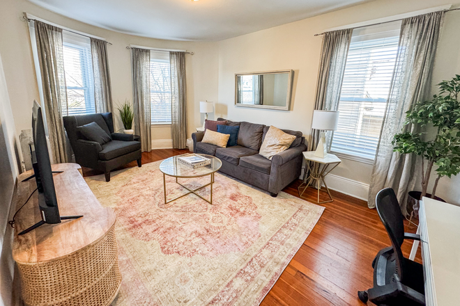 Living room, - WAS6364 Furnished 1-Bed w/ Natural Light,  Centrally Located-MBTA Apartments