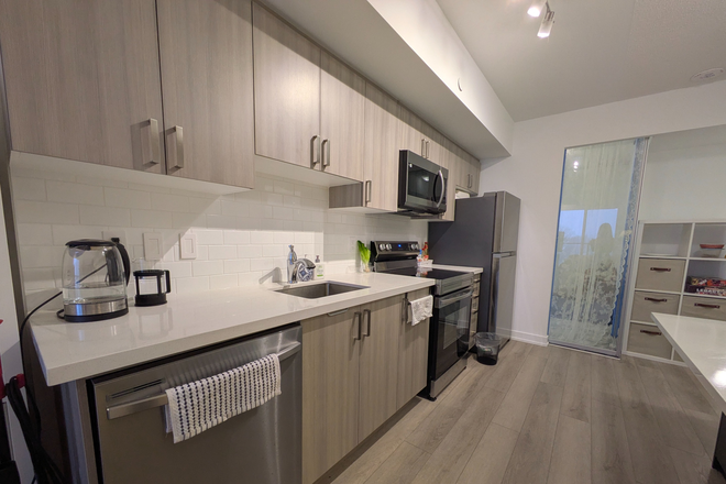Kitchen - Entire Apartment 3 Min Walk To TTC Subway, 15 Min To U of T / Ryerson / York U, 2 Bath