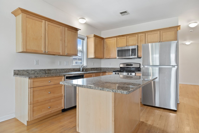Kitchen with island - 3 Bed/1 Bath top floor with off-street parking, walk to Alewife and Davis