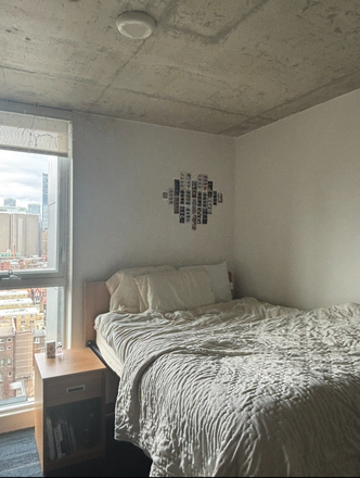 Bed and Bedside Table - 1 Furnished Large Bedroom with Kitchen at CampusOne (4bed 2bath unit)