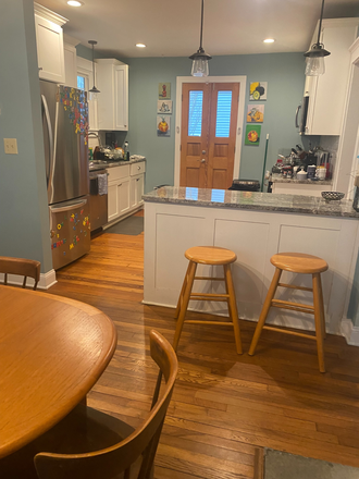 kitchen from dining area - Charming and comfortable Private home, 3 bedroom 2 bath cottage with fenced yard close to campus