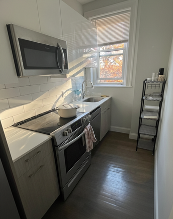 kitchen 2 with sunny window - 1-Bedroom Apartment in Fenway - $3050/mo, Available Dec 1 (Flexible Move-In)