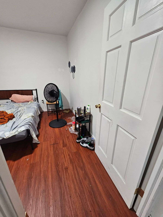 Bedroom from the doorway - Private Bedroom in Bayridge (4bd/2ba) Apartments