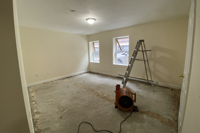 Visit hubrealtyproperties.com - Renovated one bedroom, basement level, on the T in Mission Hill, near HMS Apartments