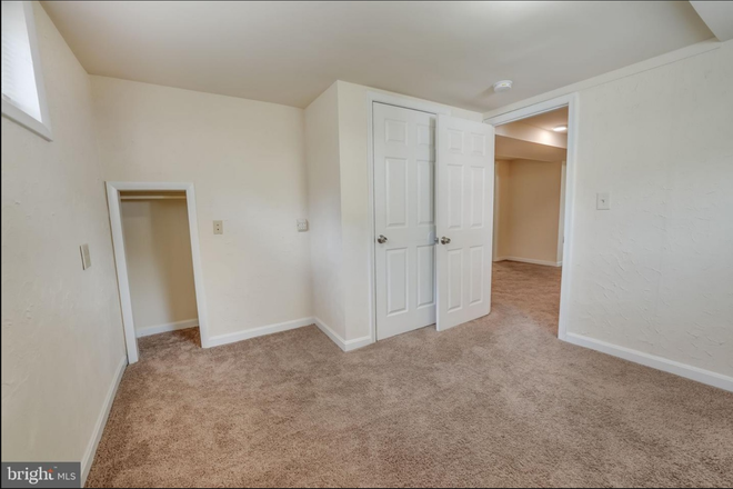 Carpeted bedroom - 2 bed, 1 bath basement apartment. Easy bus access to campus. All utilities included in rent.